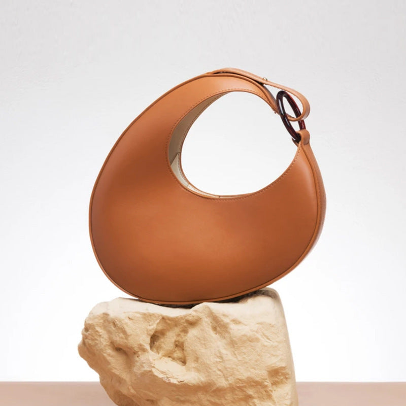 Sac à épaule en cuir sculptural