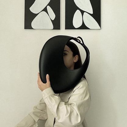 Sac à épaule en cuir sculptural